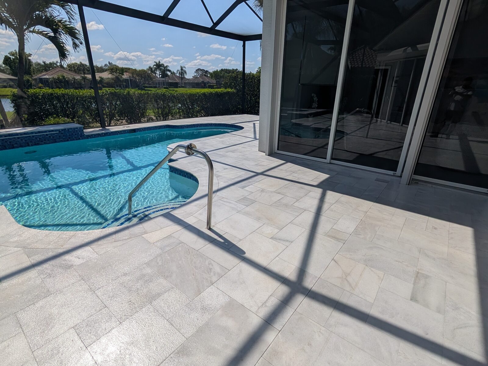 Paver driveway with palm trees